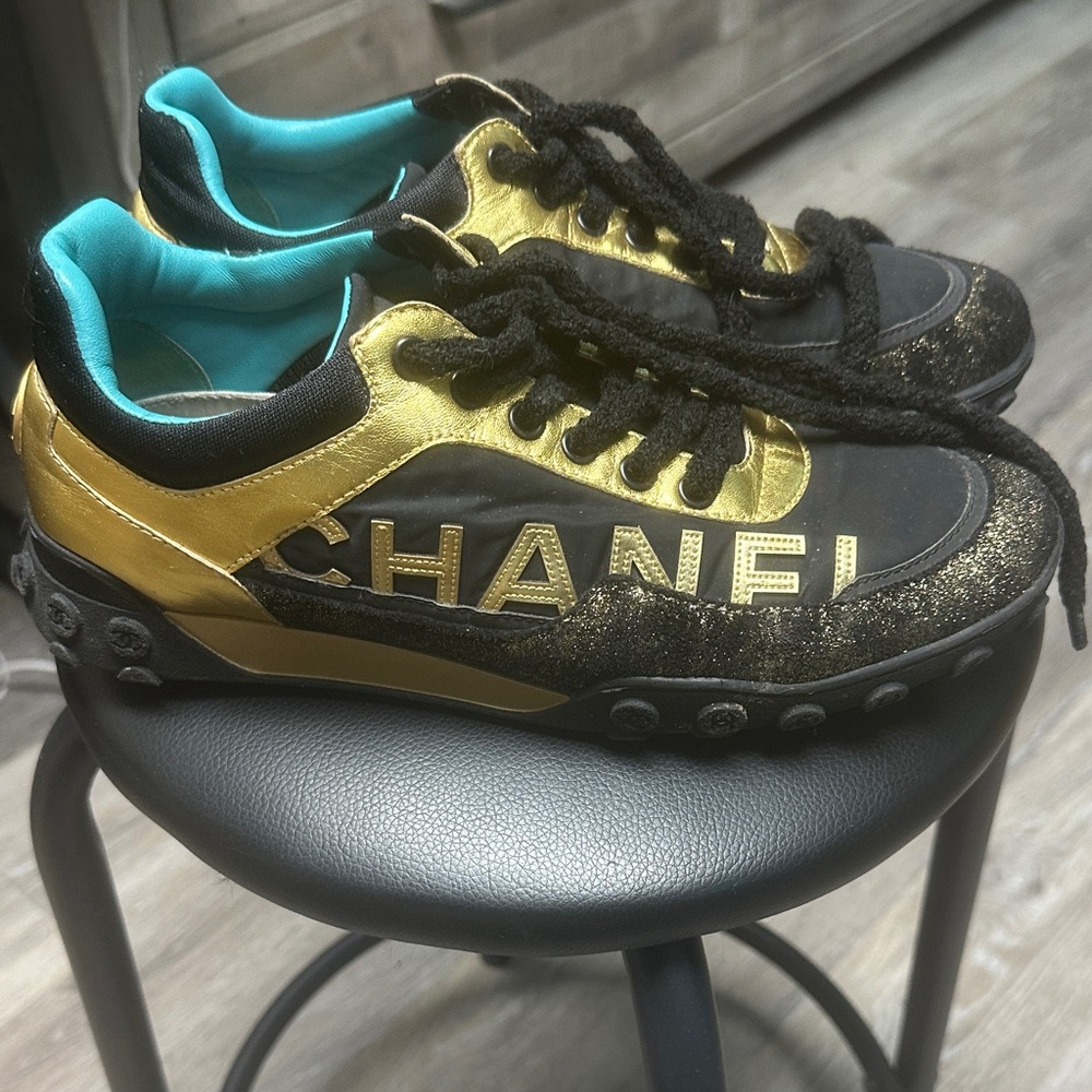 CHANEL Black and Gold Athletic Shoes